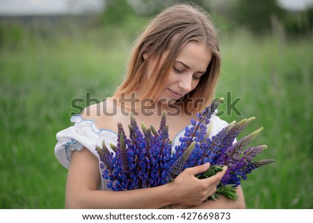 Similar – Woman posing in field of white flowers