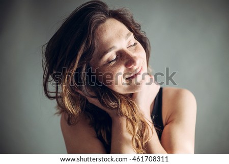 Similar – a woman lies on a green sofa. resting.