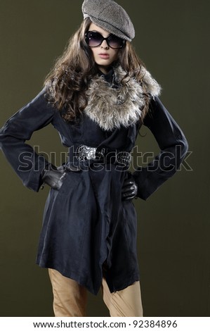 Portrait of a beautiful young woman in a fur