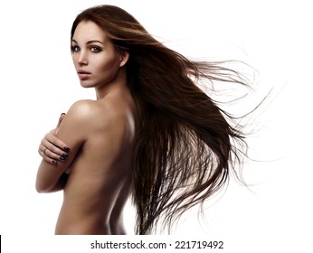 Portrait Of A Beautiful Young Woman With Hair Flying