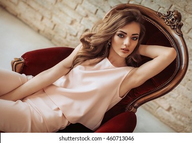 Portrait of beautiful young woman with makeup in fashion clothes - Shutterstock ID 460713046