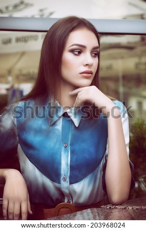 Similar – Close-up portrait of young brunette woman