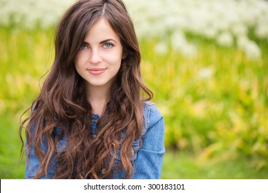 Portrait of a beautiful young woman outdoor