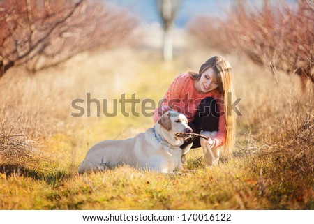 Similar – Image, Stock Photo Loving young woman offered a paw by her dog