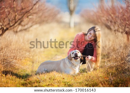 Similar – Image, Stock Photo Happy smiling dog with its pretty young owner