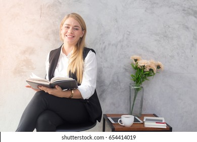 Portrait Of A Beautiful Young Woman Reading Book, 20-30 Year Old.