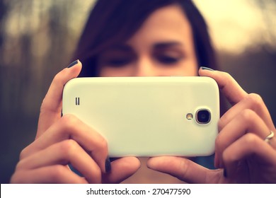 Portrait Of Beautiful Young Woman Take A Photo With Mobile Phone