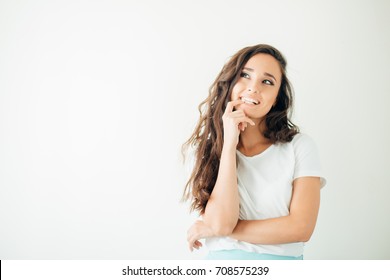 Portrait Of A Beautiful Young Woman Thinking