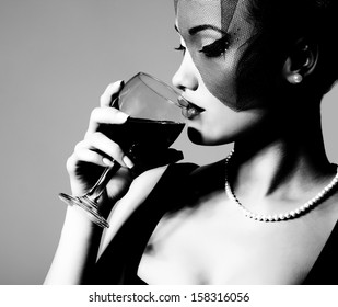 Portrait Of Beautiful Young Woman With Wine Glass, Black And White Retro Stylization