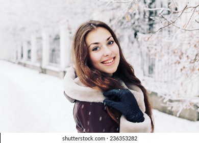 Portrait Of A Beautiful Young Woman In The Winter. 