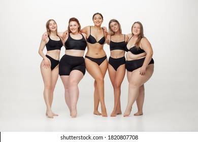 Portrait Of Beautiful Young Women With Different Shapes Posing On White Background. Happy Female Models. Concept Of Body Positive, Beauty, Fashion, Style, Feminism. Diversity.