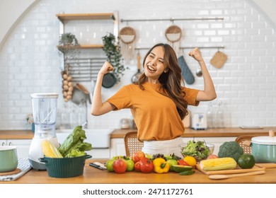 Portrait of beauty body slim healthy asian woman eating vegan food healthy with fresh vegetable salad in kitchen at home.diet, vegetarian, fruit, wellness, health, green food.Fitness and healthy food - Powered by Shutterstock