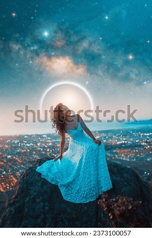 portrait beauty fantasy woman with white dress on a rock and stars and milky way over the city in the background