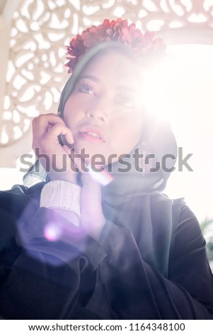 The Portrait beauty women in hijab with floral headband