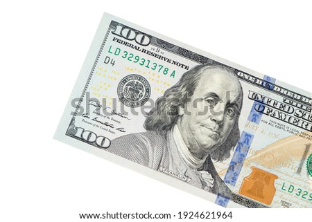 Portrait of Benjamin Franklin from one hundred dollars bill new edition macro.