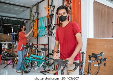 Portrait Of Bicycle Store Owner At His Shop