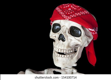 Portrait Of A Biker Skeleton With A Red Bandana Around His Head.  Shot On Black Background.