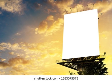 Portrait Billboard Blank For Outdoor Advertising Poster At Cloudy Sunset Sky.
