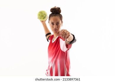 Portrait of biracial young female handball player throwing ball against white background. unaltered, copy space, sport, sports uniform, safety, athlete and team handball. - Powered by Shutterstock