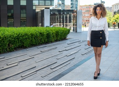 Portrait Of A Black Business Woman Walking In A Business Environment