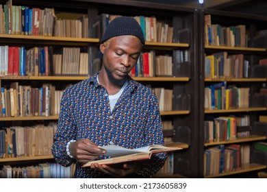 A Portrait Of An Black College Student Man In Library - Shallow Depth Of Field