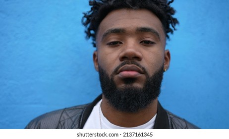 Portrait Of A Black Man Face Closeup Looking At Camera