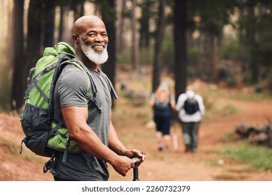 Portrait, black man and hiking in forest, exercise and fitness for wellness, healthy lifestyle and smile. Face, senior male and mature gentleman with backpack, smile and hiker in woods and fresh air