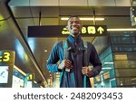 Portrait, black man and smile in airport with backpack, international and flight to New Jersey for adventure. Trip, holiday and person with luggage, happy and vacation in USA, guy and tourist