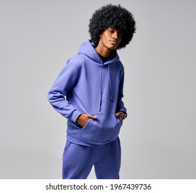 Portrait Of Black Man In Track Suit With Circle Afro Hair