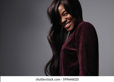 Portrait Of Black Mixed Race Woman With Long Straight Healthy Shining Hair