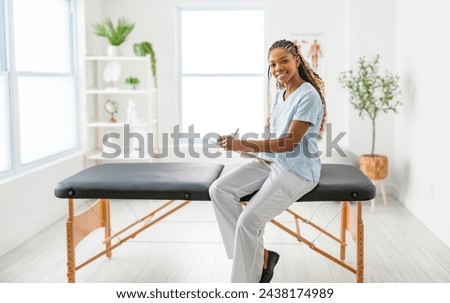 A portrait of a black physiotherapy person in uniform