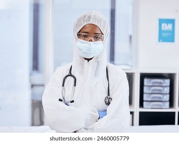 Portrait, black woman or doctor with ppe, mask and gloves in hospital for safety, covid research and vaccine. Protection, female person or healthcare worker in clinic for security, hygiene or shield