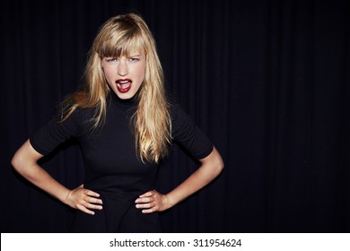 Portrait Of Blond Woman With Attitude