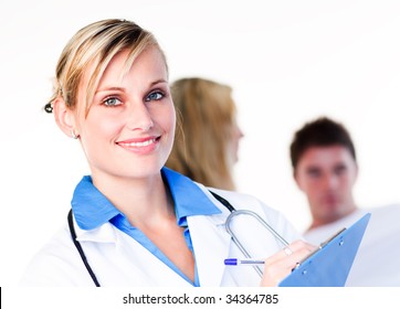 Portrait Of A Blonde Doctor With A Patient In The Background