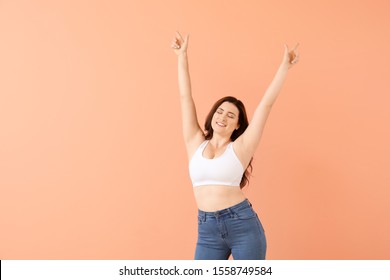 Portrait Of Body Positive Woman On Color Background