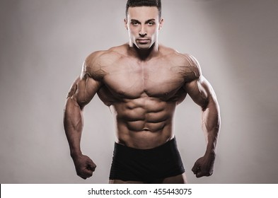 Portrait of a bodybuilder topless in the studio