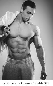 Portrait of a bodybuilder topless in the studio