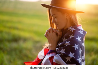 Portrait Of Boho Chic Dreaming Woman In Hat With American Flag Wearing Silver Rings With Turquoise Stone At Sunset. Jewelry Indie Girl With Hippie Style And Boho Fashion. Travel To America