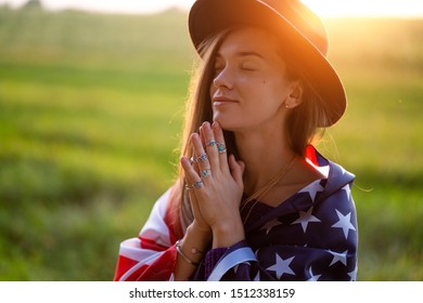 Portrait Of Boho Chic Dreaming Woman In Hat With American Flag Wearing Silver Rings With Turquoise Stone At Sunset. Jewelry Indie Girl With Hippie Style And Boho Fashion. Travel To America