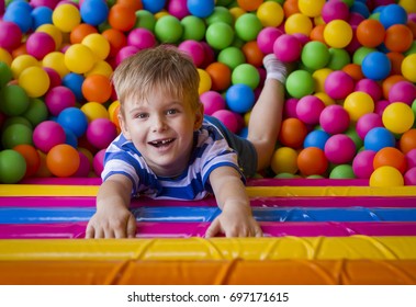Portrait of a boy in balls on a playground.
 - Shutterstock ID 697171615