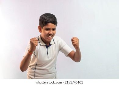 Portrait of boy celebrating his success in cricket