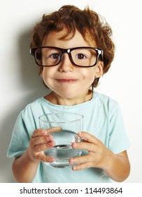 Portrait Of Boy Drinking Glass Of Water Isolated In White