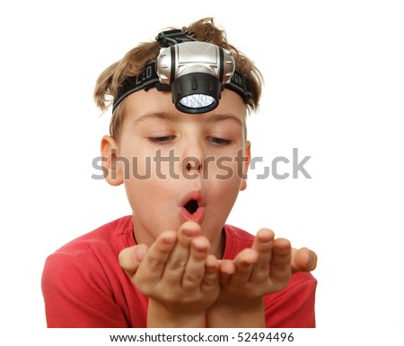 Child with magnifying glass