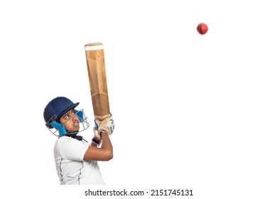 Portrait of boy hitting a shot During a Cricket Game