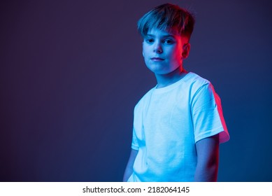 Portrait of a boy in neon light
