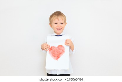 portrait boy presenting picture heart