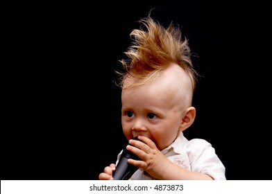 Portrait Of The Boy, Singing In A Microphone, With A Ridiculous Hairdress