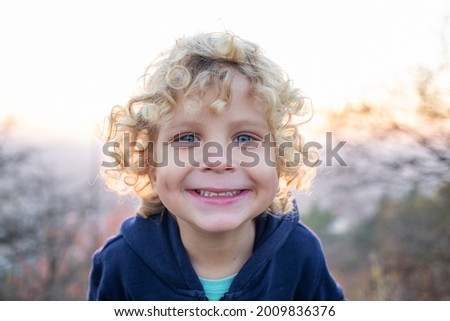 Similar – Small child with long blond hair