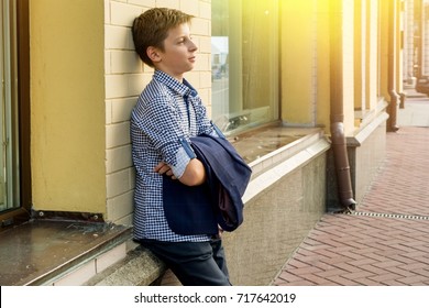 Portrait Of A Boy Teenager 13-14 Years Old.