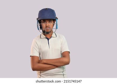 Portrait of boy wearing cricket Helmet looking front of camera